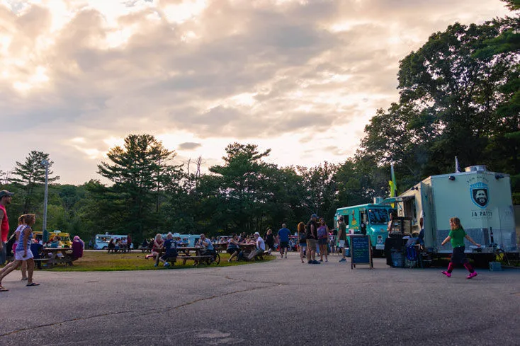 Food truck serving customers at an outdoor event
